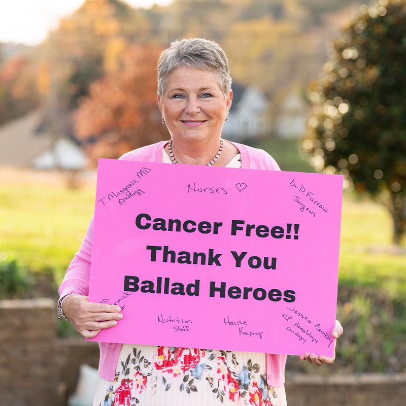 Carrol Bains patient story photo sign