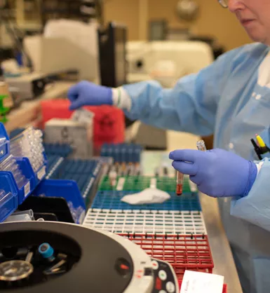 Lab technician working with blood samples